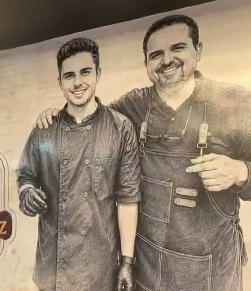 Father-and-son mural on the Mashahweez dining-room wall